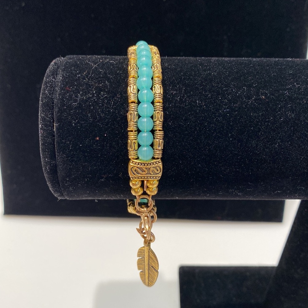 Triple Strand of Light Blue & Gold Beaded Bracelet with Feather Charm